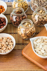 Assortment of nuts on rustic wood table