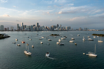 Aerial view: Luxury yacht and boat at sunset in Miami, Florida