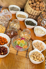 Assortment of nuts on rustic wood table