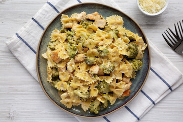 Homemade One-Pot Creamy Chicken and Broccoli Pasta on a Plate, top view. Flat lay, overhead, from above. Close-up.
