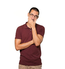 Bored young man yawning gesture