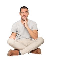 Concentrated young man making a gesture of distrust