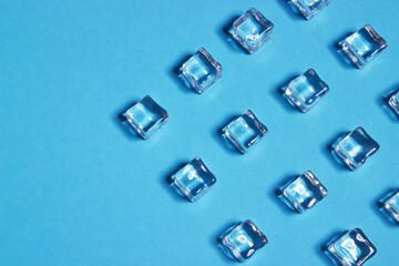 Ice cubes on blue