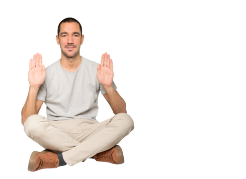 Happy young man making a gesture of stop with his palm - Powered by Adobe