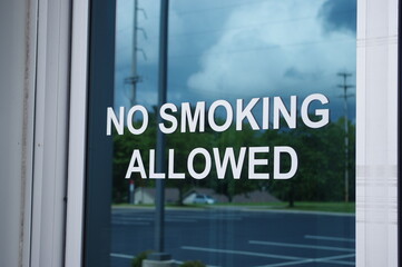 NO smoking allowed in store window