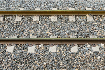 Railway tracks with track ballast stones