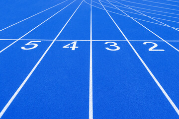 Blue track and field lanes and numbers. Running lanes at a track and field athletic center. Horizontal sport theme poster, greeting cards, headers, website and app
