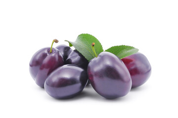 Ripe dark purple plums with leaves isolated on white background	