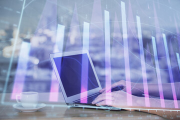 Double exposure of businesswoman hands typing on computer and forex chart hologram drawing. Financial analysis concept.