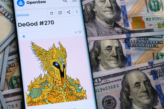 NFT DeGod #270 digital artwork on OpenSea marketplace seen on the smartphone screen which is placed on dollar bills. Concept. Stafford, United Kingdom, September 11, 2022.