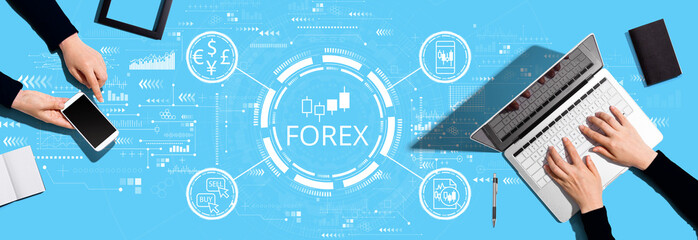 Forex trading concept with two people working together
