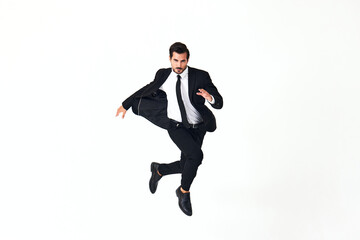 Man business smile with teeth in costume running and jumping up open mouth happiness and surprise full-length on white isolated background copy place 