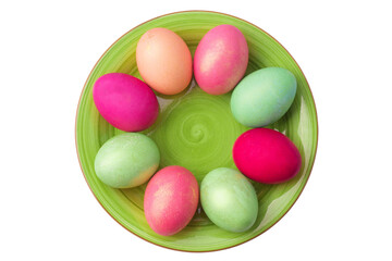 green clay plate with multicolored easter boiled eggs isolated on a white background