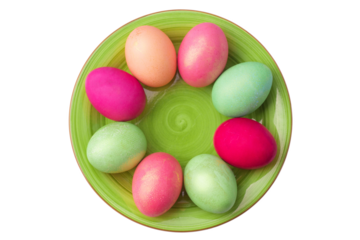 green clay plate with multicolored easter boiled eggs isolated on a white background
