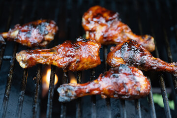 Barbecue chicken drums on the grill
