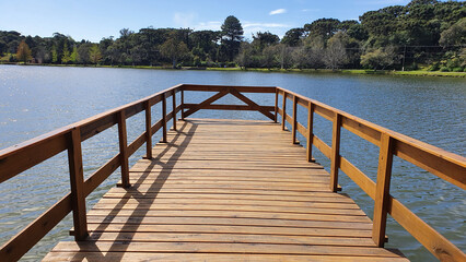 Wooden pier with beautiful view of Lake São Bernardo - São Francisco de Paula, Rio Grande do Sul, Brazil.