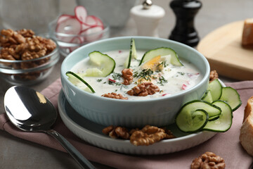 Delicious cold summer soup on table, closeup