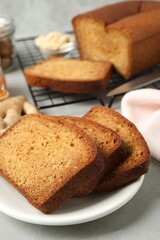 Fresh gingerbread cake slices served on light table, closeup