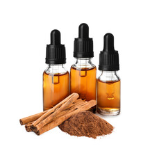 Bottles of natural essential oil, dry cinnamon sticks and powder on white background