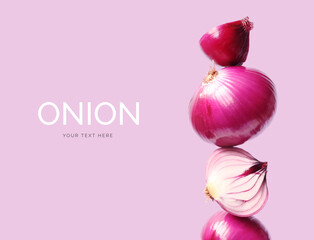 Creative layout made of red onion on the purple background. Flat lay. Food concept. Macro  concept.  - obrazy, fototapety, plakaty
