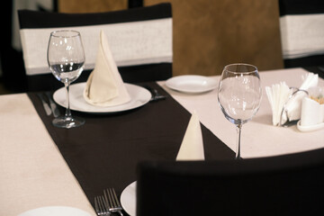 Banquet table with wineglasses. High angle of elegant banquet table served for wedding celebration