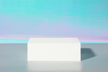 Mock up background with geometric podium for product display. product stand in minimal slyle on blue and pink background.