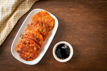 Korean Kimchi pancake or Kimchijeon - Fried Mixed Egg, Kimchi, and Flour