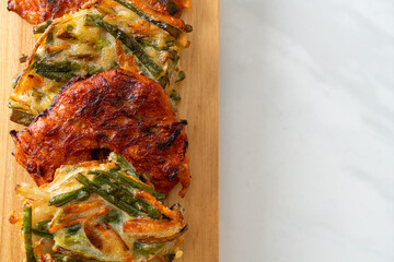 Pajeon or Korean pancake and Korean Kimchi pancake or Kimchijeon on white background
