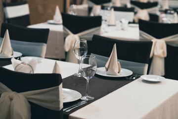 Banquet table with wineglasses. High angle of elegant banquet table served for wedding celebration