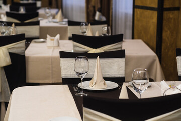 Banquet table with wineglasses. High angle of elegant banquet table served for wedding celebration