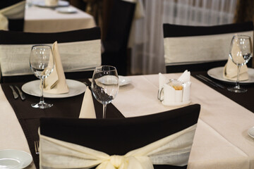 Banquet table with wineglasses. High angle of elegant banquet table served for wedding celebration