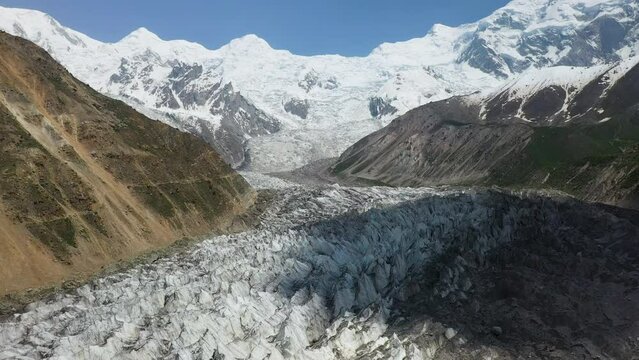 Aerial shot of Nanga Parbat with a glacier, Fairy Meadows Pakistan, cinematic wide revealing drone shot