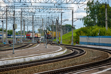 Fototapeta na wymiar Railway tracks at the station