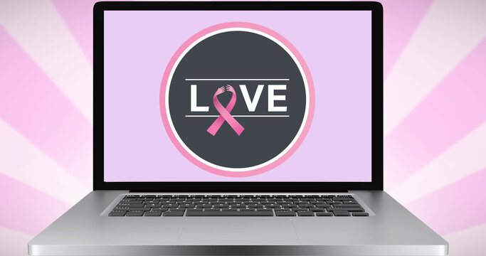Image of pink ribbon logo and love text on laptop screen