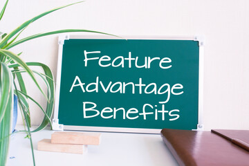 Text Feature Advantage Benefits written on the green chalkboard
