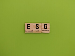 The concept of ESG is environmental, social, and governance with a green background.