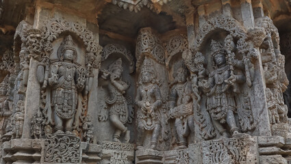 The Sculpture of Hindu God and Goddess on the Hoysaleshwara Temple, Halebeedu, Hassan, Karnataka, India.