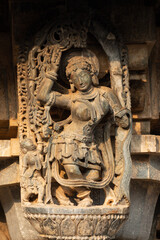 Fototapeta na wymiar The Sculpture of Dancers on the Hoysaleshwara Temple, Halebeedu, Karnataka, India.