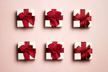 Gift boxes over the pink background. 