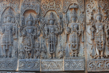 Fototapeta na wymiar The Sculptures of Hindu God Goddess on the Temple Hoysaleshwara, Halebeedu, Hassan, Karnataka, India. 