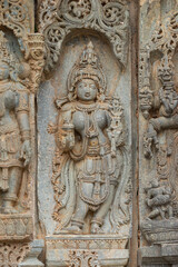 Fototapeta na wymiar The Carving of Hindu Goddess on the Hoysaleshwara Temple, Halebeedu, Hassan, Karnataka, India.
