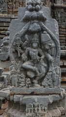 Fototapeta na wymiar The Dancing Sculpture of Lord Shiva on the Hoysaleshwara Temple, Halebeedu, Hassan, Karnataka, India.