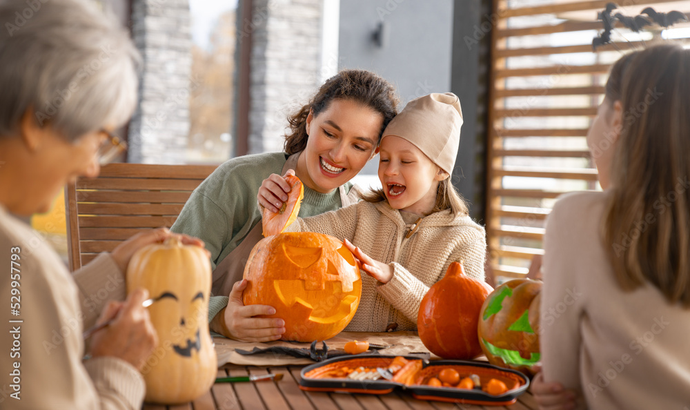 Wall mural family preparing for Halloween