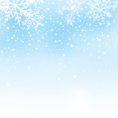 Winter snowfall and snowflakes on light blue background. Xmas and New Year background. Vector