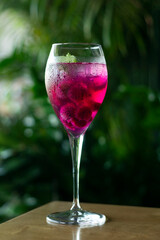 raspberry and red dragon fruit prosecco wine spritzer cocktail
