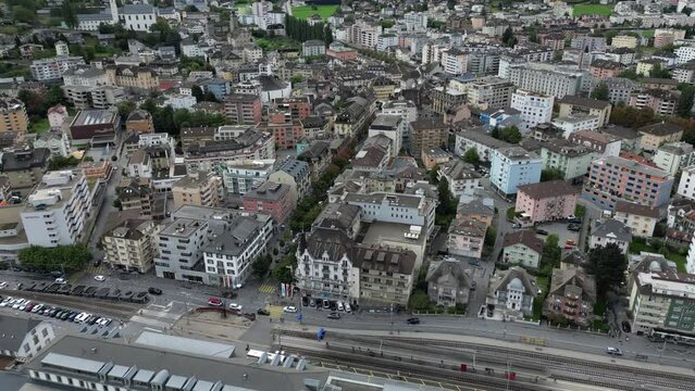 Brig the city in the Valais Alps. The photo shows the Bahnhofstrasse in Brig. It is a small beautiful city in Switzerland in the canton of Valais. The traffic runs
