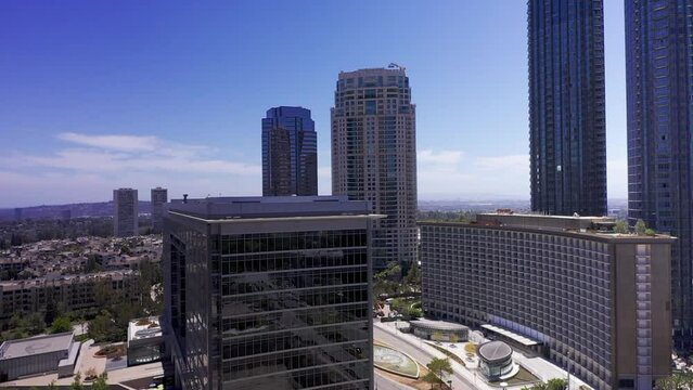 Rising and panning aerial shot of Century City, California. HD at 60 FPS