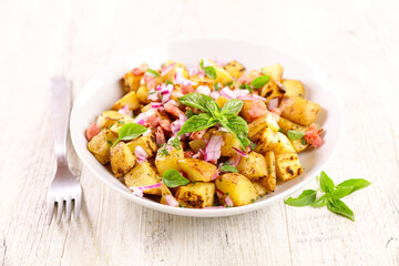 grilled potato with bacon and herbs