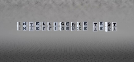 intelligence test word or concept represented by black and white letter cubes on a grey horizon...