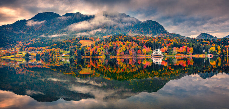 Panoramic autumn view of Grundlsee lake. Stunning sunrise in Brauhof village, Styria stare of Austria, Europe. Calm morning view of Austrian Alps. Beauty of nature concept background.
